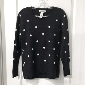 Navy blue scoop neck polka dot sweater.